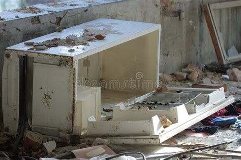 damaged brushed steel box|broken stainless steel fridge.